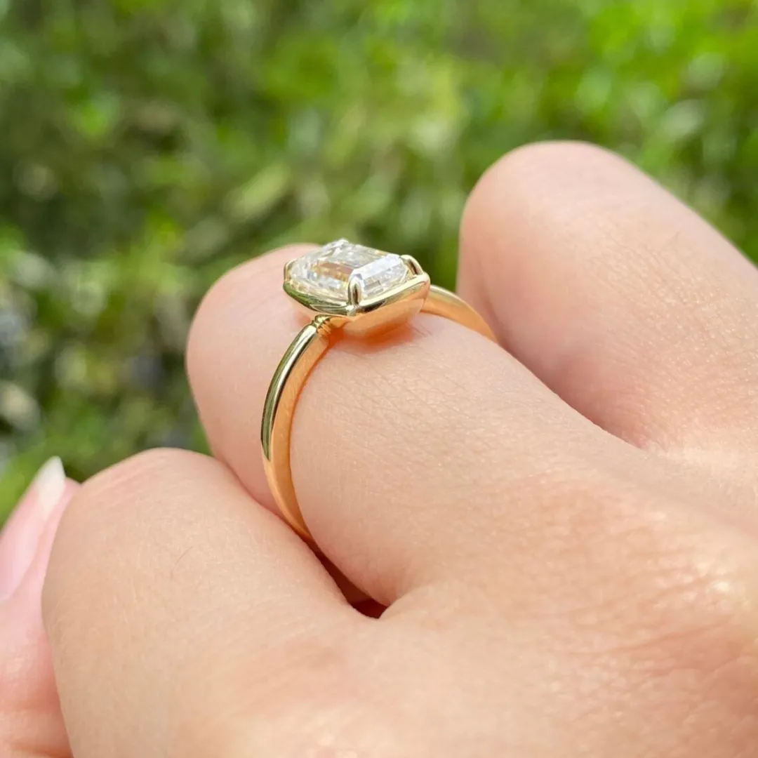 /public/photos/live/Elongated Emerald Cut Bezel Moissanite Ring 451 (1).webp